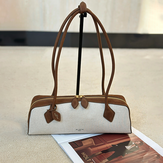 alaia le teckel long‑handle canvas suede shoulder handbag